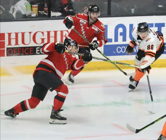 Wheeling Nailers' Sean Josling battles Fort Wayne Komets' Drake Rymsha