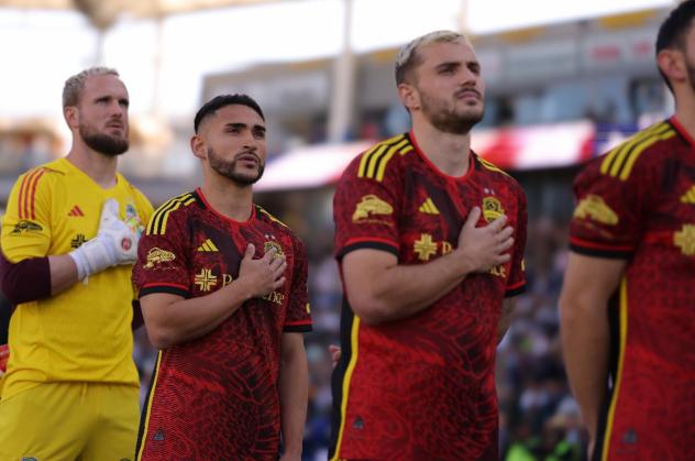 Jordan Morris (right) and Cristian Roldan (second from left) of Sounders FC