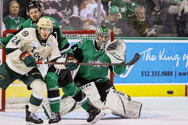 Iowa Wild's Mitchell Balmas and Texas Stars' Remi Poirier in action