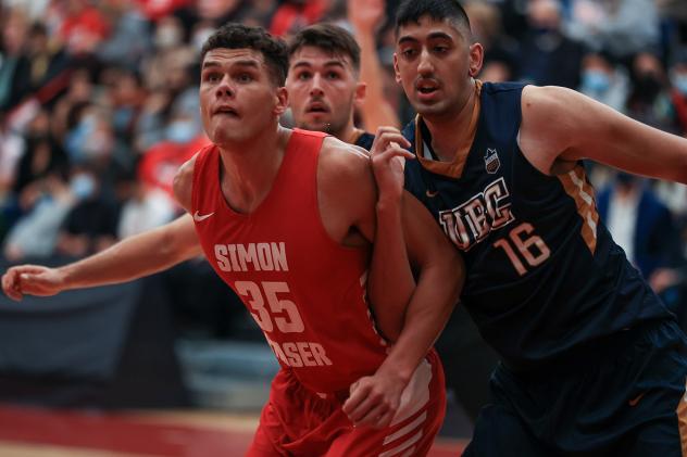 Forward Julian Roche with Simon Fraser University