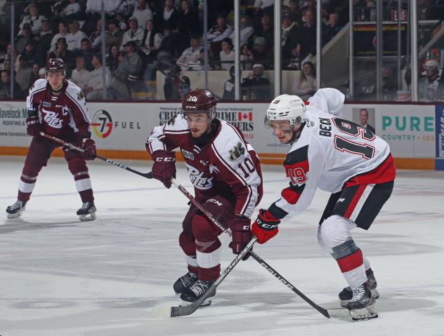Peterborough Petes' J.R. Avon and Ottawa 67's' Jack Beck in action