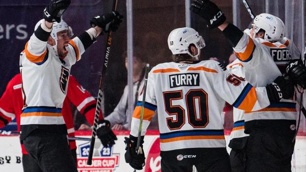 Lehigh Valley Phantoms' Brendan Furry and Tyson Foerster celebrate win