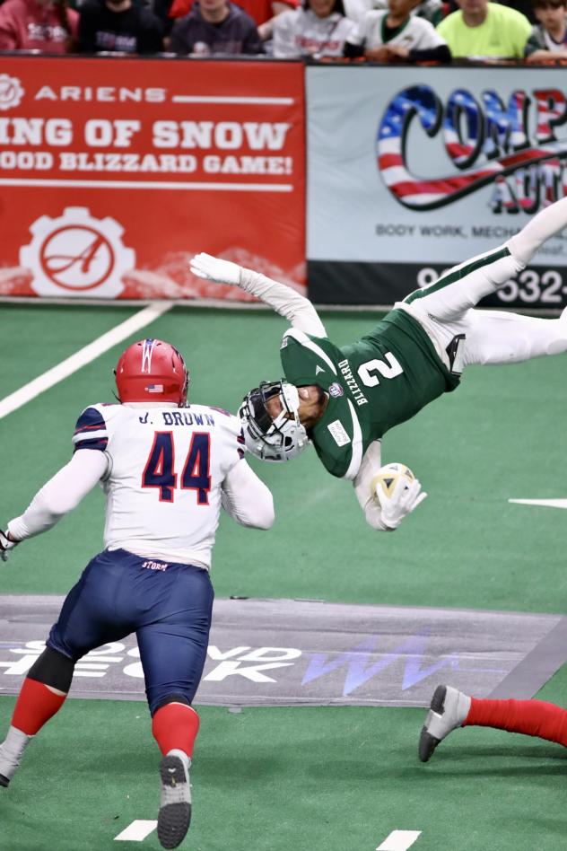 Sioux Falls Storm's James Brown and Green Bay Blizzard's Ja'rome Johnson in action
