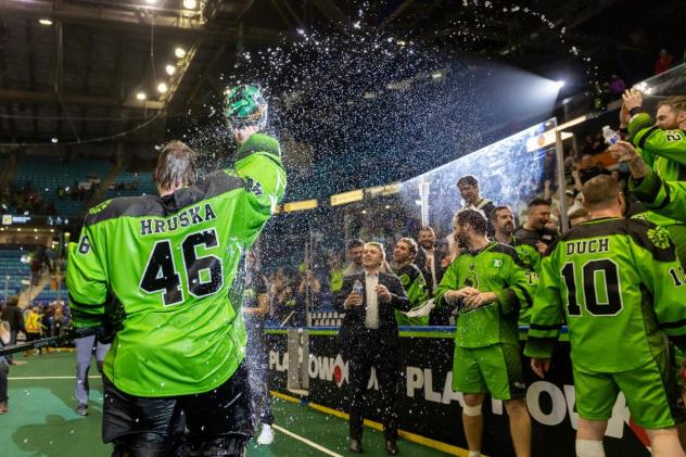 Saskatchewan Rush goaltender Laine Hruska celebrates with the crowd