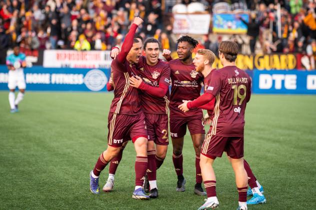 Detroit City FC reacts following a goal