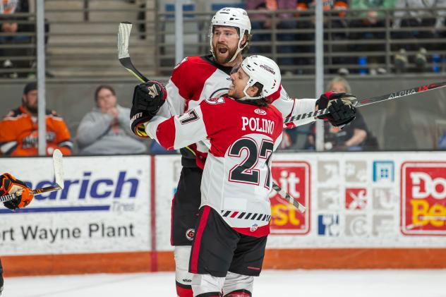 Cincinnati Cyclones' Patrick Polino and Justin Vaive celebrate win