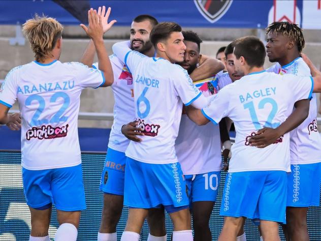 Las Vegas Lights FC's Alexander Romero congratulates teammates