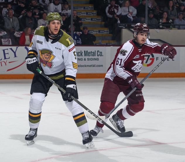 North Bay Battalion's Tnias Mathurin and Peterborough Petes' Chase Stillman on game night