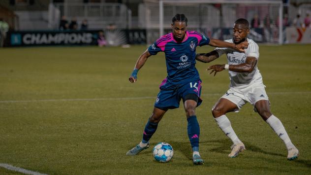 South Georgia Tormenta FC defender Nick Akoto (left)