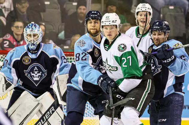 Texas Stars' Riley Tufte and Milwaukee Admirals' Xavier Bouchard on game night