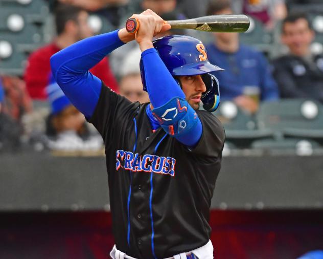 Tim Locastro of the Syracuse Mets awaits a pitch