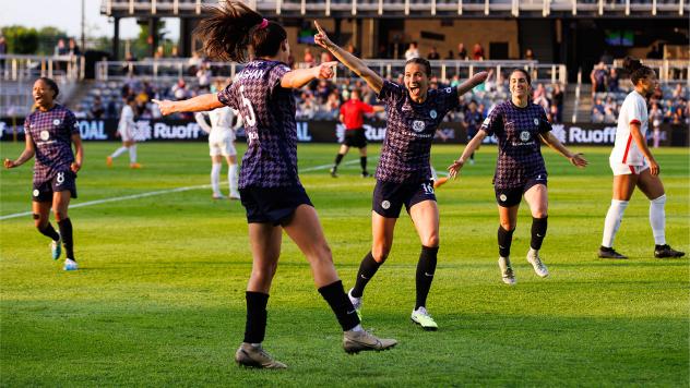 Racing Louisville FC celebrates a goal