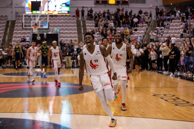 Calgary Surge's Trevon Scott and Simi Shittu celebrate win