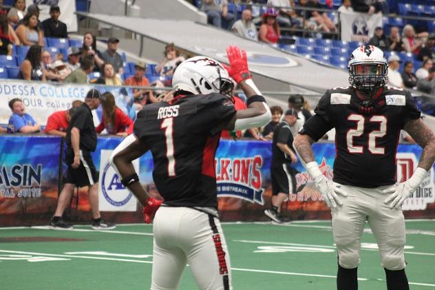 Jacksonville Sharks defensive back Marvin Ross and FB/LB Brandon Munoz