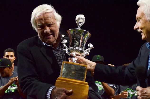 Dave Elmore raising the Northwest League Championship trophy
