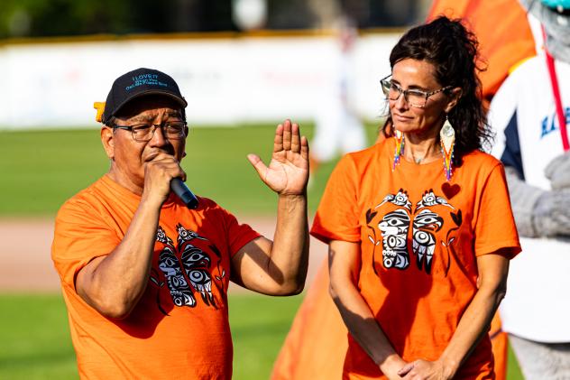 Residential School Survivor Eddy Charlie with Kristin Spray of the Victoria Orange Shirt Day organization on National Indigenous Peoples Day