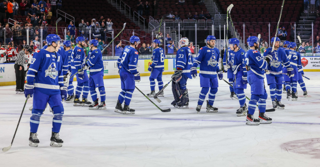 Wichita Thunder exchange congratulations after a win