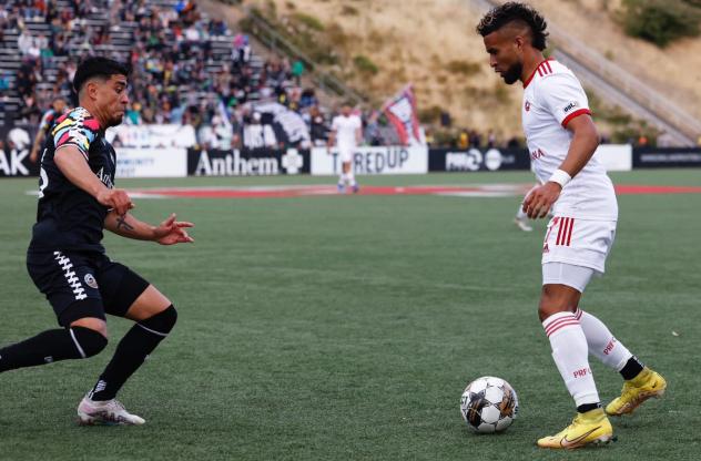 Phoenix Rising FC and the Oakland Roots in action