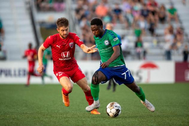 Indy Eleven midfielder Cam Lindley (left) vs. Hartford Athletic
