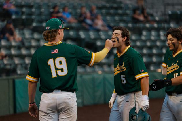 Sanford Mainers' Logan Poteet and Devan Bade on game night