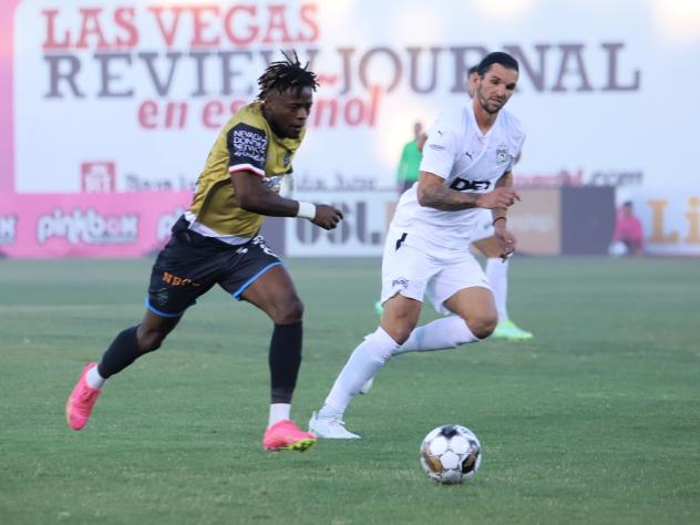 Las Vegas Lights FC's Tabort Etaka Preston battles Tampa Bay Rowdies' Forrest Lasso
