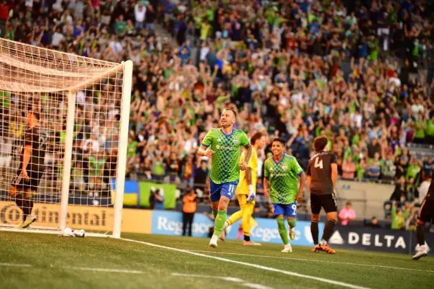 Seattle Sounders FC's Albert Rusnák and Raúl Ruidíaz on the field