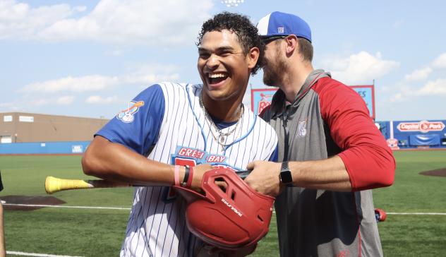 Jayson Jones and the Green Bay Rockers celebrate a walk off win