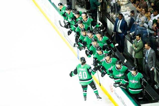 Texas Stars exchange congratulations along the bench
