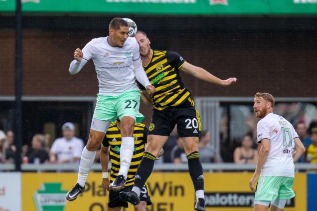 Detroit City FC forward Yazeed Matthews (left) vs. the Pittsburgh Riverhounds