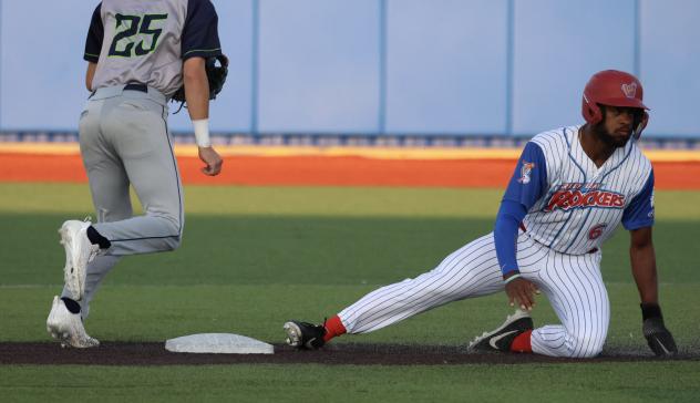 Green Bay Rockers outfielder Kendal Ewell after sliding