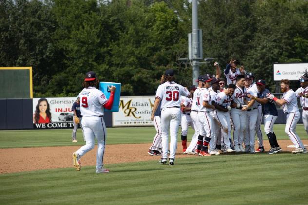 Rome Braves celebrate a walk-off win