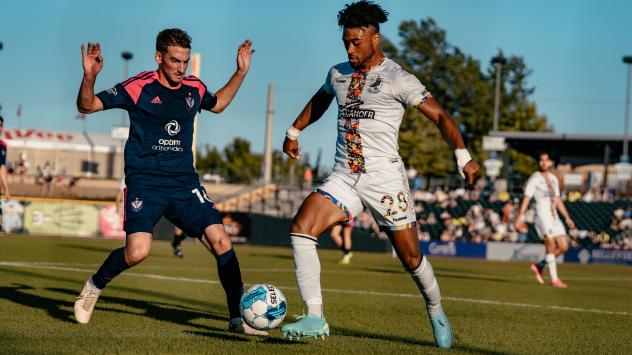 South Georgia Tormenta FC defender Davey Mason (left) vs. Union Omaha