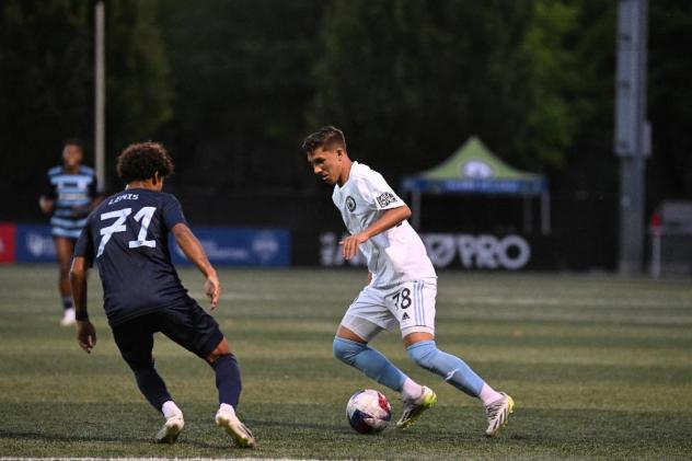 Tacoma Defiance defender Pedro Rodrigues (right)