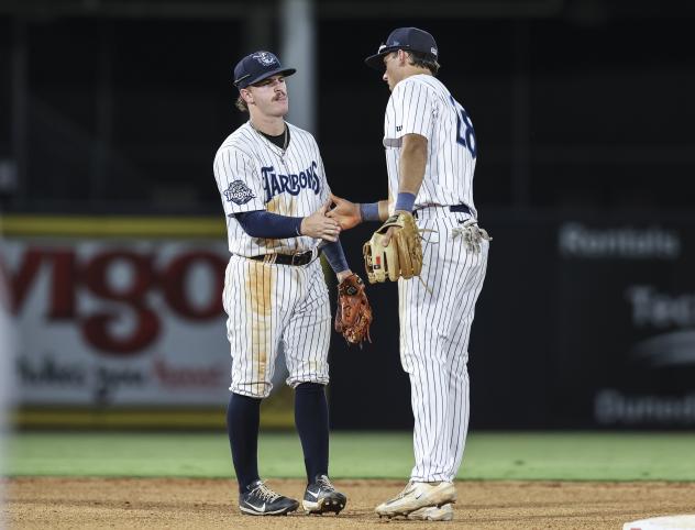 Tampa Tarpons' Roc Riggio congratulates Beau Brewer