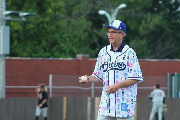 Evansville mayor Lloyd Winnecke throws out a first pitch at an Otters game