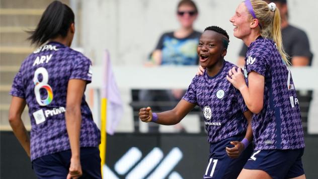 Racing Louisville FC forward Thembi Kgatlana (center) celebrates a goal
