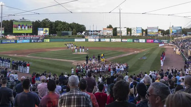 Jersey Shore BlueClaws fans during the National Anthem at ShoreTown Ballpark