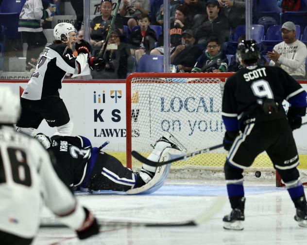 Victoria Royals' Tanner Scott and Justin Kipkie in action