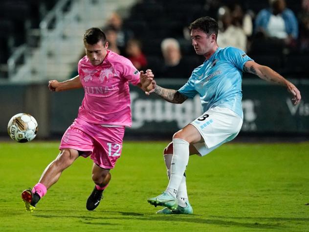 Las Vegas Lights FC's Tyler Bagley battles Colorado Springs Switchbacks FC's Jay Chapman