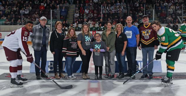 Peterborough Petes' Donovan McCoy and London Knights' Max McCue on Bell Community Heroes Night