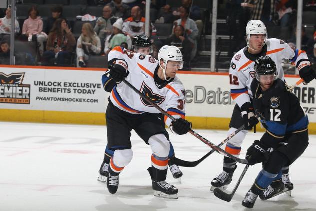 Lehigh Valley Phantoms' Darion Hanson battles Cleveland Monsters' Owen Sillinger