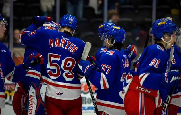 Kitchener Rangers' Mitchell Martin celebrates with team
