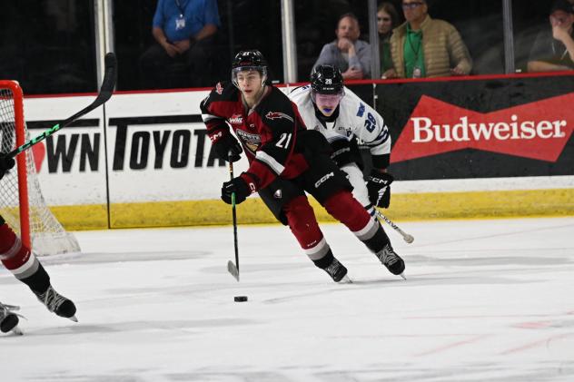 Vancouver Giants' Adam Titlbach and Wenatchee Wild's Conor Geekie in action