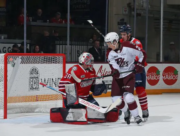Oshawa Generals' Jacob Oster and Peterborough Petes' Braydon McCallum on game night