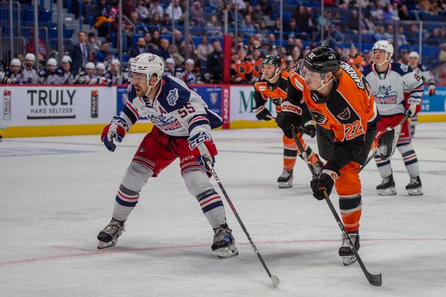 Hartford Wolf Pack's Alex Belzile and Lehigh Valley Phantoms' Logan Day on the ice