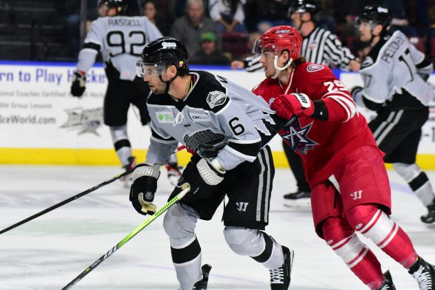 Idaho Steelheads' Wade Murphy and Allen Americans' Colby McAuley in action