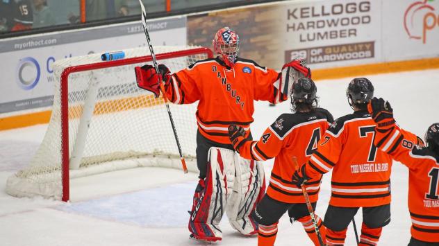 Danbury Hat Tricks line up to exchange congratulations