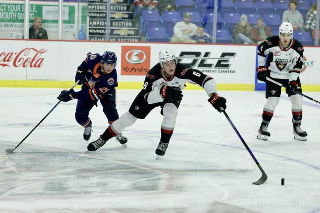 Vancouver Giants' Colton Roberts and Kamloops Blazers' Zach Pantelakis in action
