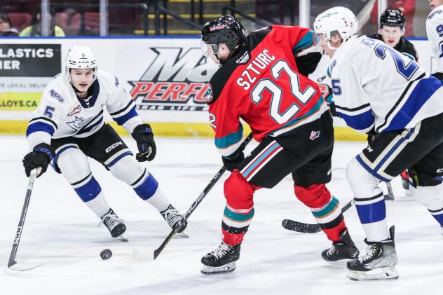 Victoria Royals' Austin Zemlak versus Kelowna Rockets' Gabriel Szturc