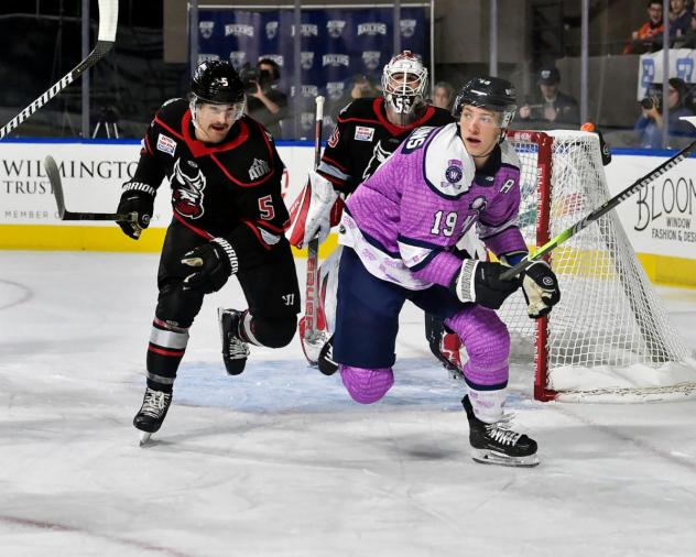 Adirondack Thunder's Will MacKinnon and Worcester Railers' Blade Jenkins in action